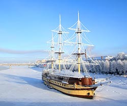 Sailboat frozen in ice