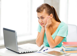 Stressed student with computer