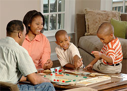 Family playing a board game